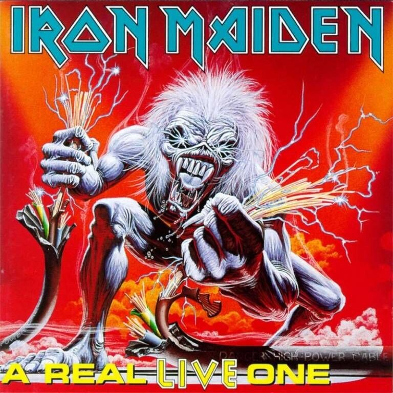 Eddie manipulando cables eléctricos en la portada del álbum en directo A Real Live One (1993) de Iron Maiden.